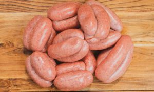 Handcrafted sausages for dogs - 100% chicken treats supporting pet's health and happiness by Roar Pet Food.
